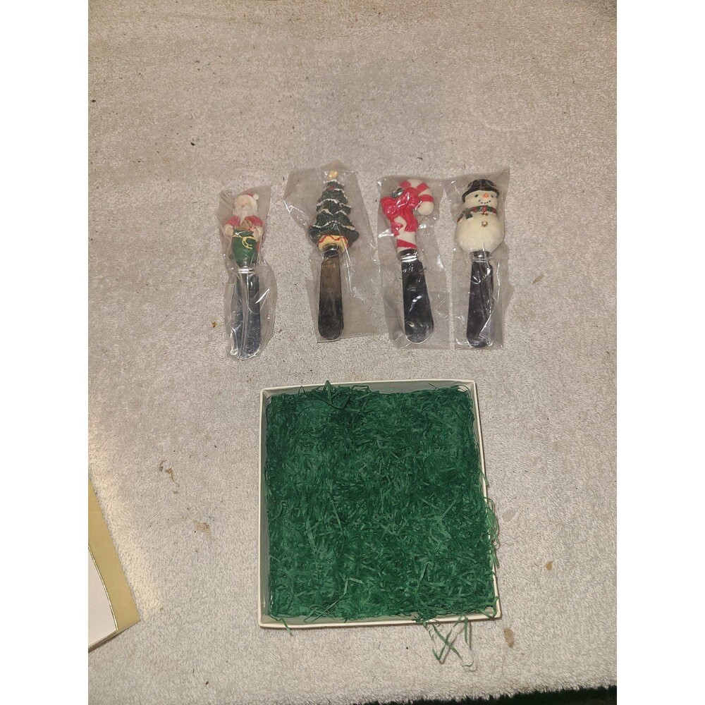 Set of Four Christmas Themed Stainless Steel Party Spreaders